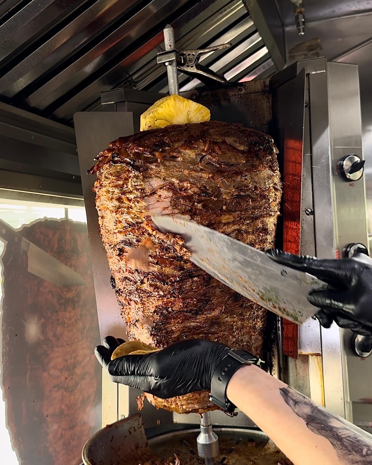 Trompo al pastor flame-roasted at Tacos El Viejon